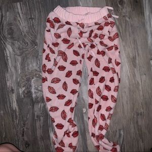 ( S ) Red Lips sweatpants ( could be PJ’s )